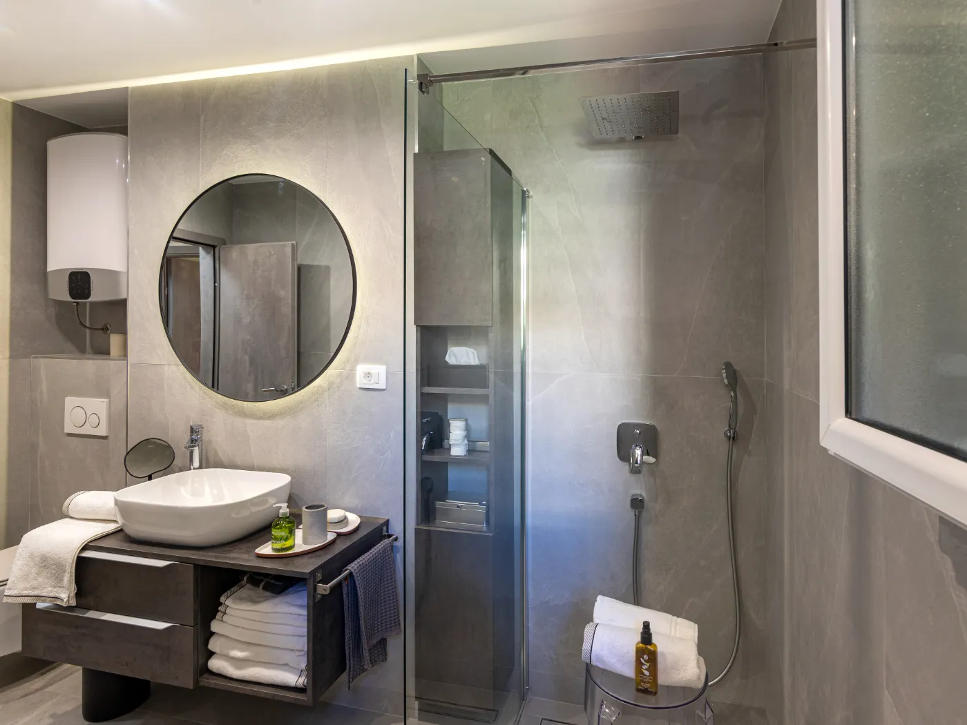 Bathroom with a walk-in shower and basin