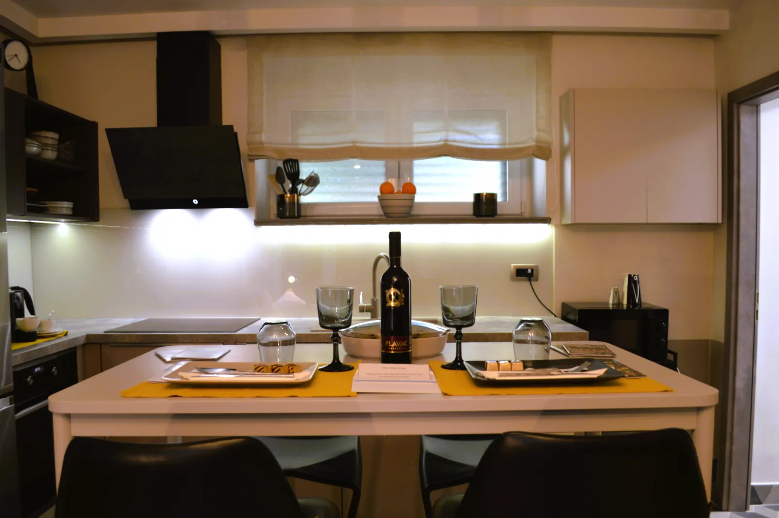 The dining table beside the kitchen in the open-plan room